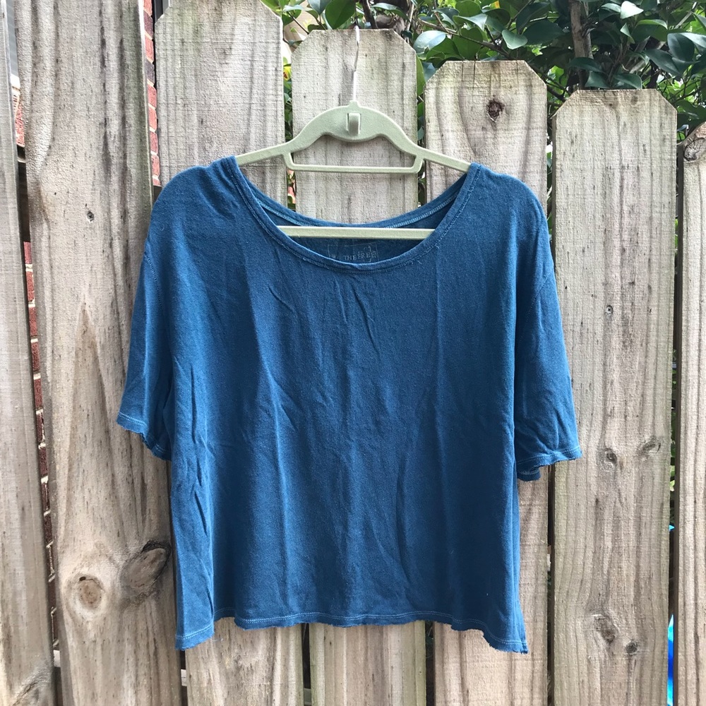 Free People tee in blue, raw hem, great condition!